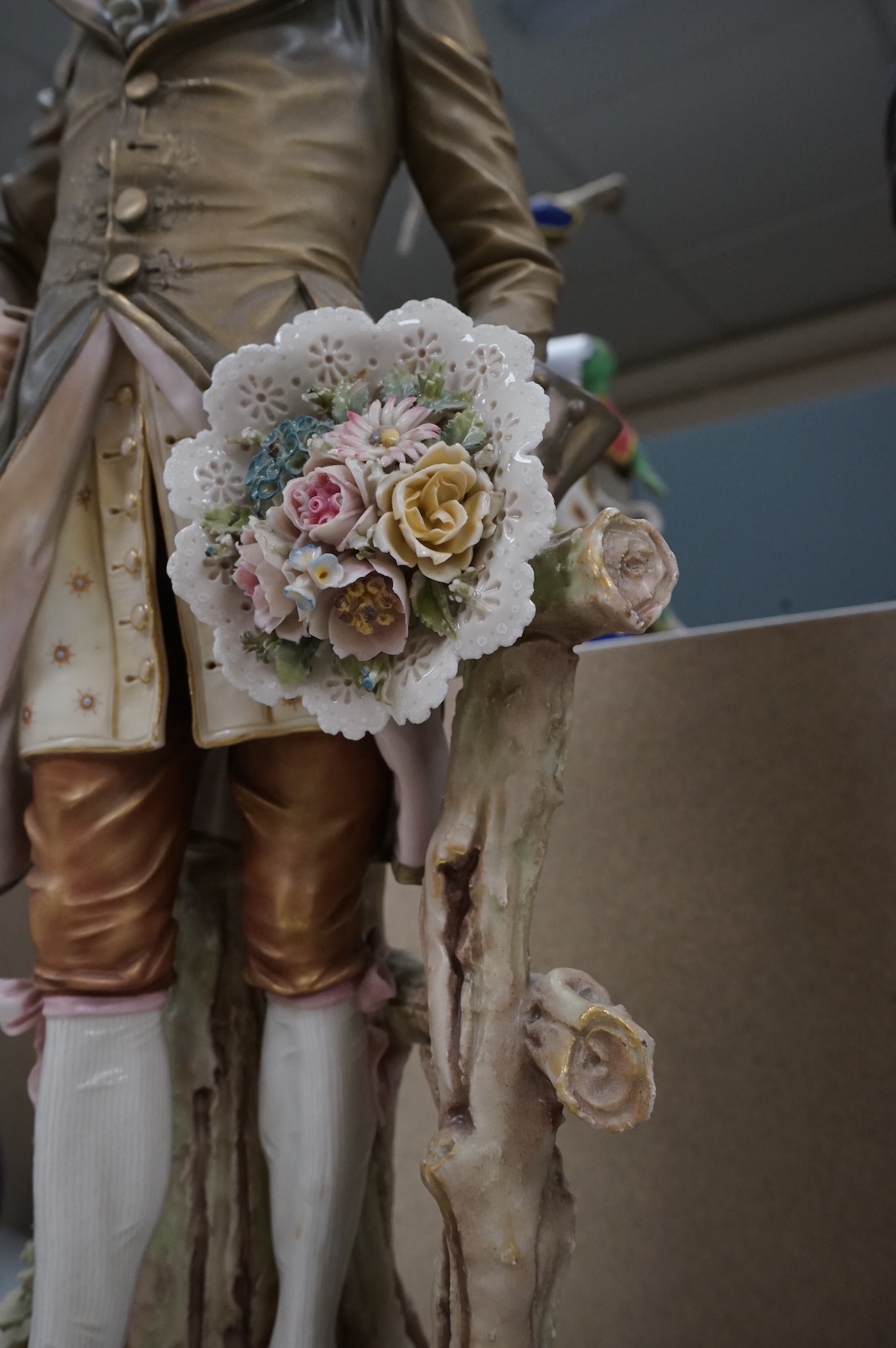 A large Royal Dux figure of a gent, 60cm
